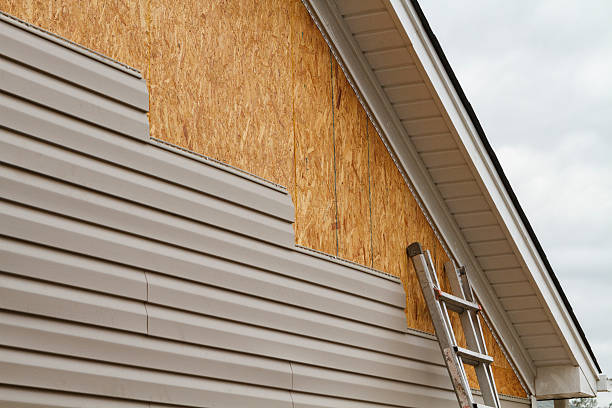Professional Siding Installation technician working in Newton Upper Falls, MA
